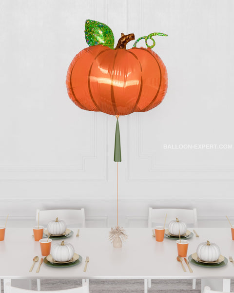 Fall Pumpkin Supershape Balloon with Tassel, inflated with helium