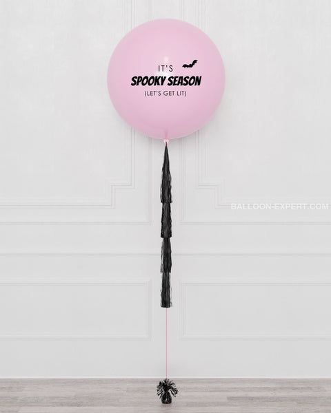 Spooky Cute Custom Jumbo Balloon with Tassels, inflated with helium