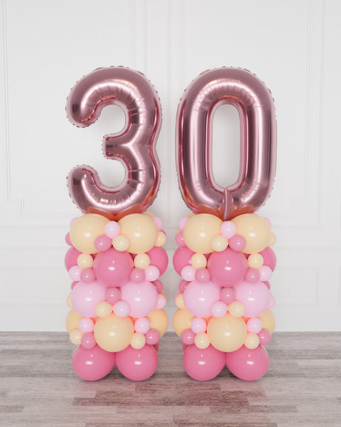 Blush and Pink Double Number Balloon Columns from Balloon Expert
