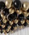 Black and Gold - Ceiling Balloons inflated with heliums