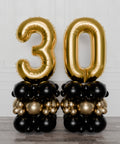 Black and Gold Double Number Balloon Columns, inflated with air