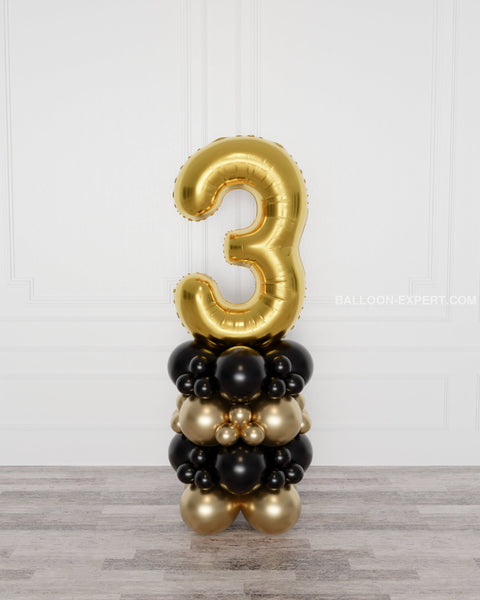 Black and Gold Number Balloon Column, inflated with air