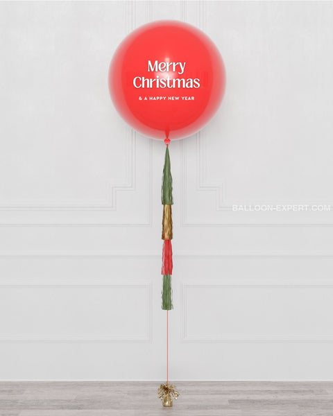 Christmas Jumbo Balloon with Tassels inflated with helium