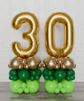 Green and Gold Double Number Balloon Columns, inflated with air