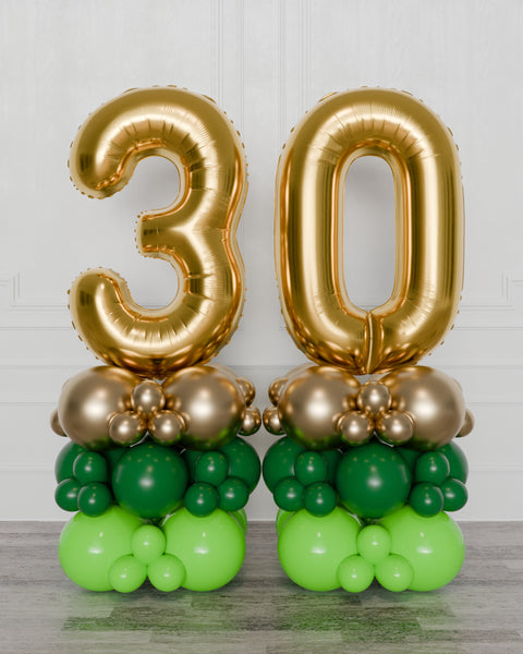 Green and Gold Double Number Balloon Columns, inflated with air