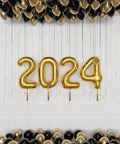 Graduation 2024 Balloon Package, in Black and Gold latex balloons, inflated with helium