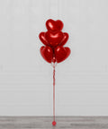 Red Heart Foil Balloon Bouquet, 7 Balloons, closeup image, sold by Party Expert