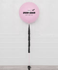 Spooky Cute Custom Jumbo Balloon with Tassels, inflated with helium