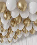White and Gold Ceiling Balloons inflated with helium