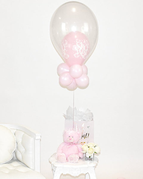 Centre de table ballon rose pour fête prénatale