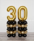 Black and Gold Double Number Balloon Columns from Balloon Expert