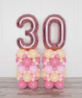 Blush and Pink Double Number Balloon Columns from Balloon Expert
