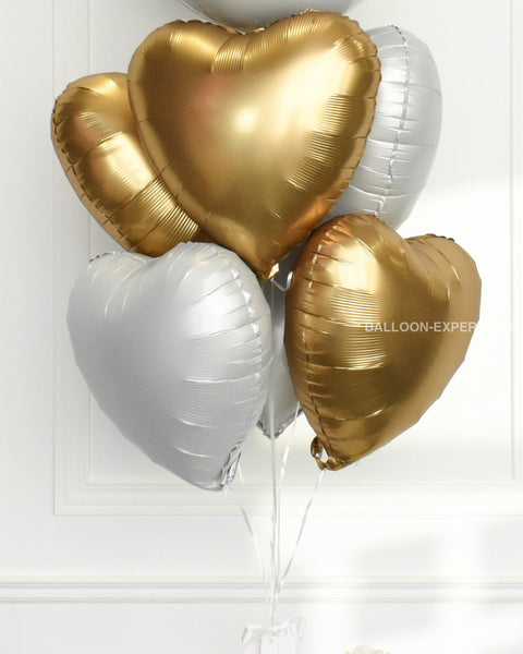 gold and white foil heart balloons, closer image