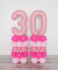 Pink and Fuchsia Double Number Balloon Columns from Balloon Expert